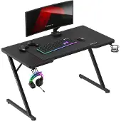 Huzaro Hero 2.5 | Gaming Tisch PC Schreibtisch Computertisch | Getränkehalter Kopfhörerhalter Carbon Tischplatte 120x60cm | Homeoffice Gamer | Schwarz