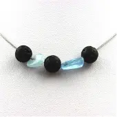Bijoux Steine und Mineralien. Lava Perlen Halskette 8 mm + Brasilianischer Aquamarin Edelstahlkette.