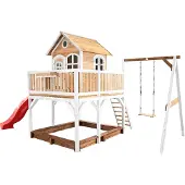 Axi Spielhaus Liam mit Sandkasten, Schaukel & roter Rutsche | Stelzenhaus XXL in Braun & Weiß aus FSC Holz für Kinder | Spielturm mit Wellenrutsche für den Garten