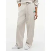 Tommy Hilfiger Jogginghose Logo Exaggerated Seam WW0WW50783 Creme Relaxed Fit
