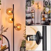 Hofstein Cesaro Stehlampe aus Metall/Glas in Schwarz/Bernstein mit Fußschalter