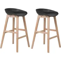 Beliani Barstuhl 2er Set Schwarz Kunststoff-Sitzschale mit Hellen Holzbeinen Fußstütze Sitzhöhe 72 cm ohne Lehne Modernes Design Barhocker Tresenhocker