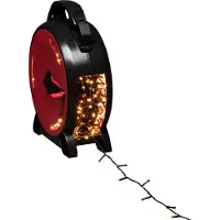 Konstsmide Micro LED Lichterkette mit Kabelaufroller, 1000 bernsteinfarbene Dioden, 30V, Außen (IP44), schwarzes Soft-Kabel - 3839-807