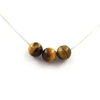Bijoux Steine und Mineralien. Halskette mit 3 Perlen Tigerauge 8 mm Kette aus rostfreiem Stahl.