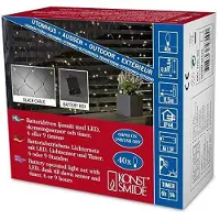 Konstsmide - LED Lichternetz, mit Lichtsensor und 6h und 9h Timer, 40 warm weiße Dioden, batteriebetrieben, Außen (IP44), schwarzes Kabel, 4 x AA 1.5V (exkl.); 3723-100