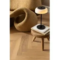 Nuura Aps LED Tischlampe Blossi, dimmbar, schwarz, für Wohn- / Esszimmer, Metall, Skandinavisch, LED Tischlampe