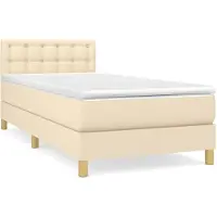 Syfax Boxspringbett mit Matratze Creme 90x200 cm Stoff