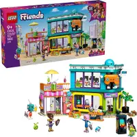 LEGO Friends Comic- und Spieleladen - Modellbau mit funktionierendem Spielzeugautomaten, Slush-Eis-Laden, 4 Minifiguren und Zubehör - Alien und Einhorn - Geschenk für Mädchen ab 9 Jahren - 42674