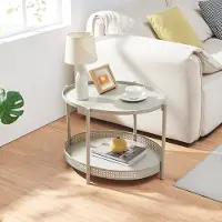 En.casa Couchtisch 'Jäller' Metall oval in Rattan-Optik 66 x 51 x 44 cm Taupe
