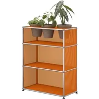 USM United Soft USM Haller Sideboard, mit perforierten Metallelementen und Pflanzeneinlage Reinorange