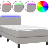 Syfax Boxspringbett mit Taschenfederkernmatratze, höhenverstellbarem Kopfteil, LED-Beleuchtung, Stoff Hellgrau, 90x190 cm, inkl. Matratzenauflage