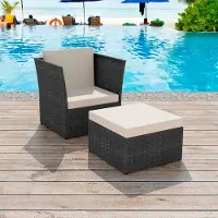 Syfax Gartensessel mit Fußhocker Poly Rattan Schwarz