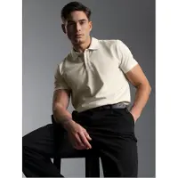 Trigema Poloshirt "Slim Fit Poloshirt aus DELUXE-Piqué" 1