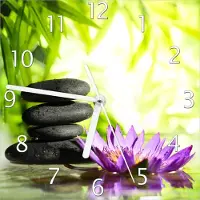 Wallario Design Wanduhr Steinstapel in schwarz mit Blumenblüte in lila aus Echtglas, Größe 20 x 20 cm