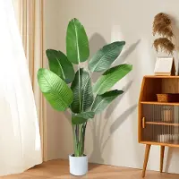 Unyqoos künstlicher Bananenbaum 120 cm – 8 naturgetreue Blätter, pflegeleichter Kunstbaum im eleganten weißen Topf, verstellbare Zweige für Wohnzimmer & Büro