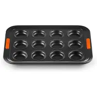 Le Creuset Antihaft Muffinform, Für 12 Stück (Ø 7 cm), Sauerteigbeständig, Aus Karbonstahl gefertigt, Anthrazit/Orange, 46058000010000
