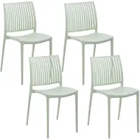 Beliani Gartenstuhl 4er Set Hellgrün Kunststoff Stapelbar mit Streben ohne Armlehnen Modern Outdoor Balkon Terrasse Garten Kunststoffstuhl Plastikstuhl