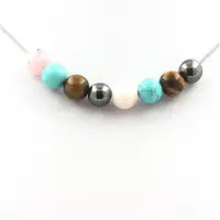 Bijoux Steine und Mineralien. Halskette mit Hämatit- + Türkis- + Tigeraugen- + Rosenopalperlen 8 mm Kette aus rostfreiem Stahl.