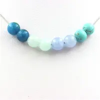 Bijoux Steine und Mineralien. Halskette mit Perlen aus Angelit + Aquamarin + Türkis + Apatit 8 mm, Kette aus rostfreiem Stahl.