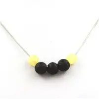 Bijoux Steine und Mineralien. Lava Perlen Halskette 8 mm + gelbe Kalzite aus dem Vereinigten Königreich Kette aus Edelstahl.