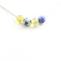 Bijoux Steine und Mineralien. Halskette mit 4 Perlen Lapislazuli aus Pakistan + Citrin 8 mm Kette aus rostfreiem Stahl.