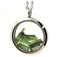 Bijoux Steine und Mineralien. Roh-Turmalin-Kette. Medaillon-Modell 30 mm. Farbe Silber.