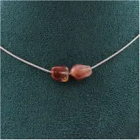 Bijoux Steine und Mineralien. Halskette mit 2 roten Rutilquarzperlen aus Brasilien, Stahlkette. Halskette für Frauen, Männer. Anpassbare Größe.