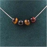 Bijoux Edelsteine und Mineralien. Halskette mit 4 Perlen Tigerauge Mischfarben 8 mm. Kette aus Stahl Halskette für Frauen, Männer. Anpassbare Größe