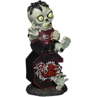Foco South Carolina sitzt auf Logo Zombie mit Fu ball