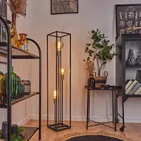Hofstein Avola »Avola« Bodenlampe aus Metall in Schwarz/Messingfarben