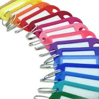 Combicraft Schlüsseletiketten mit ausziehbarem Papier in Dunkelgrün 55x22 mm - 100er Pack