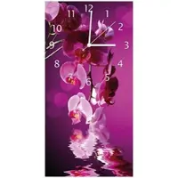 Wallario Design Wanduhr Rosafarbene Orchidee Blüten in pink aus Echtglas, Größe 30 x 60 cm